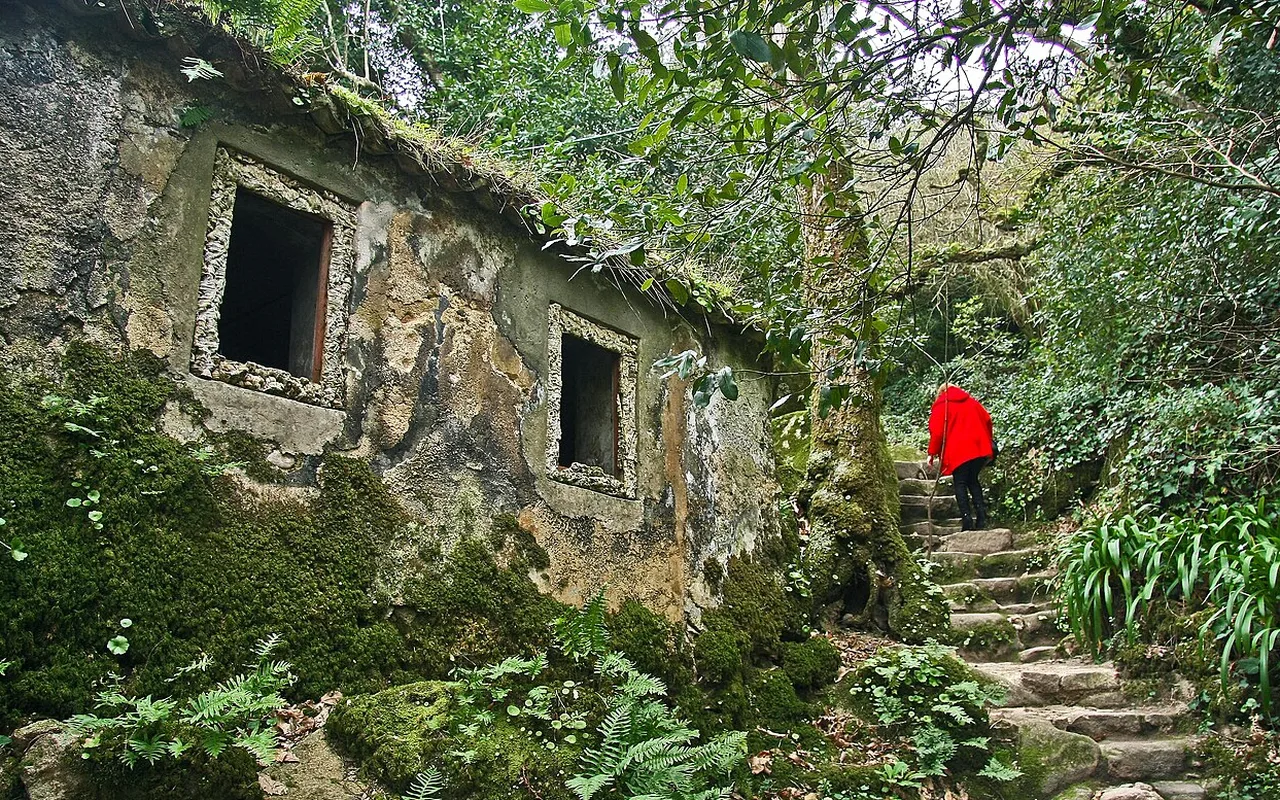Small openings in the convent's mossy outer wall
